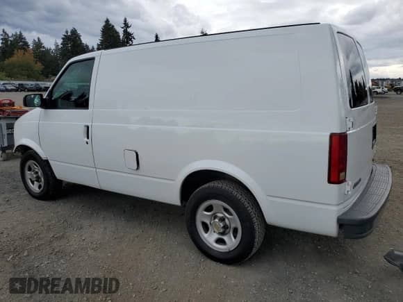 2005 Chevrolet Astro Cargo с VIN 1GCDM19X55B122358, выставлен на аукционе Copart как лот 86123825 с пробегом 71 717 миль миль и Списание • Salvage title. История ставок и продаж доступна на DreamBid. Изображение 2.