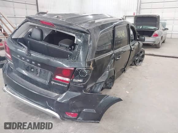 2018 Dodge Journey Crossroad z VIN 3C4PDDGG2JT467079, wystawiony jako IAAI lot #43113665 z przebiegiem 75 469 mil mil oraz . Historia ofert i sprzedaży dostępna na DreamBid. Obrazek 4.