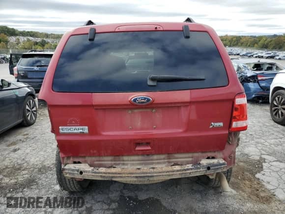 2011 Ford Escape XLT с VIN 1FMCU9DG0BKA15467, выставлен на аукционе Copart как лот 86098375 с пробегом 112 090 миль миль и Списание • Salvage title. История ставок и продаж доступна на DreamBid. Изображение 6.
