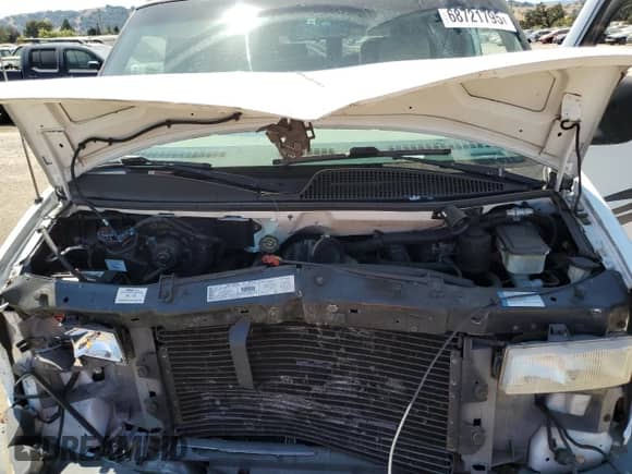 2000 Chevrolet Express Cargo YF7 z VIN 1GBFG15R9Y1214210, wystawiony jako Copart lot #68721795 z przebiegiem 153 219 mil mil oraz Szkoda całkowita • Salvage title. Historia ofert i sprzedaży dostępna na DreamBid. Obrazek 12.