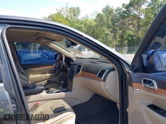 2011 Jeep Grand Cherokee Overland Summit with VIN 1J4RR6GT7BC728944, listed as a IAAI auction lot 43278747 with 193,581 mi miles and . Bid and sale history available at DreamBid. Image 5.