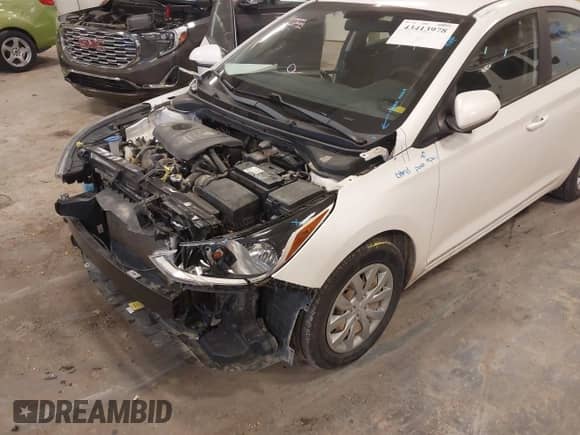 2018 Hyundai Accent SE z VIN 3KPC24A34JE010059, wystawiony jako IAAI lot #43413978 z przebiegiem 60 998 mil mil oraz . Historia ofert i sprzedaży dostępna na DreamBid. Obrazek 6.