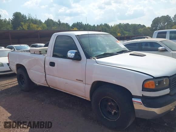 2002 GMC Sierra 1500 SL z VIN 1GTEC14V62Z900828, wystawiony jako IAAI lot #43205215 z przebiegiem Nie podano mil oraz . Historia ofert i sprzedaży dostępna na DreamBid. Obrazek 1.