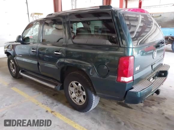 2003 Cadillac Escalade с VIN 1GYEK63N03R264582, выставлен на аукционе IAAI как лот 42758672 с пробегом 273 347 миль миль и . История ставок и продаж доступна на DreamBid. Изображение 3.