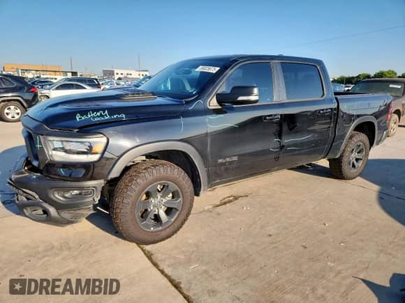 2020 Ram 1500 Rebel z VIN 1C6SRFLT0LN357023, wystawiony jako Copart lot #69025675 z przebiegiem 114 804 mil mil oraz Szkoda całkowita • Salvage title. Historia ofert i sprzedaży dostępna na DreamBid. Obrazek 1.