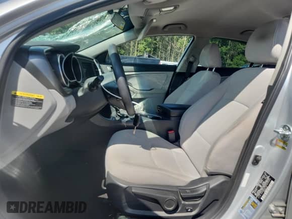 2015 Kia Optima LX с VIN 5XXGM4A70FG505453, выставлен на аукционе Copart как лот 71975875 с пробегом 183 665 миль миль и Списание • Salvage title. История ставок и продаж доступна на DreamBid. Изображение 7.