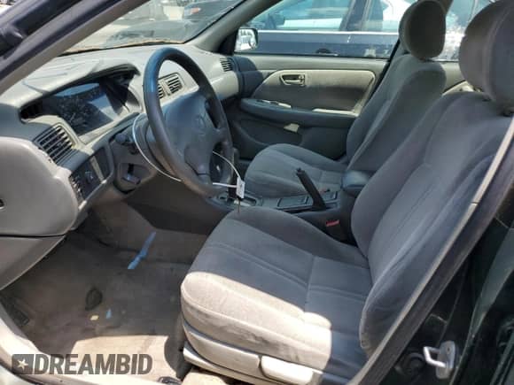 1999 Toyota Camry LE z VIN 4T1BG22K7XU443923, wystawiony jako Copart lot #61206005 z przebiegiem 265 239 mil mil oraz Czysty tytuł • Clean title. Historia ofert i sprzedaży dostępna na DreamBid. Obrazek 7.