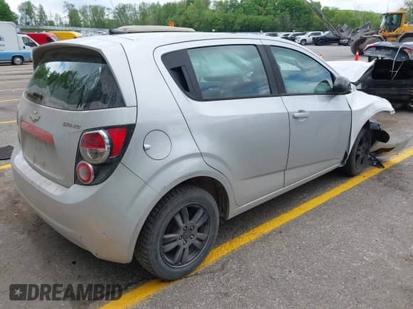 2012 Chevrolet Sonic LS with VIN 1G1JB6SH6C4153749, listed as a IAAI auction lot 42274553 with 165,248 mi miles and . Bid and sale history available at DreamBid. Image 4.