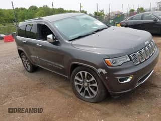 2017 Jeep Grand Cherokee Overland with VIN 1C4RJFCG6HC964435, listed as a IAAI auction lot 42407567 with 113,760 mi miles and . Bid and sale history available at DreamBid. Image 1.
