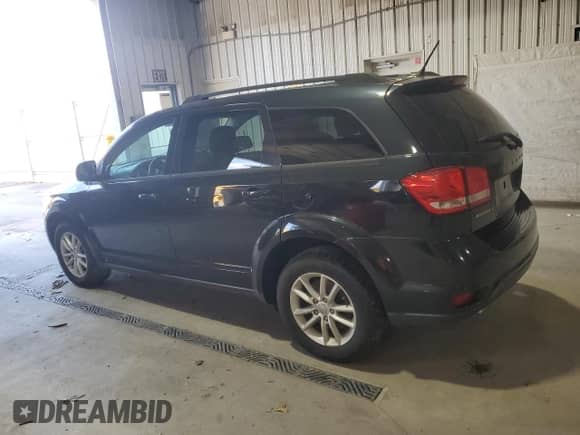2013 Dodge Journey SXT with VIN 3C4PDCBGXDT716525, listed as a Copart auction lot 86057335 with 157,035 mi miles and Salvage title. Bid and sale history available at DreamBid. Image 2.