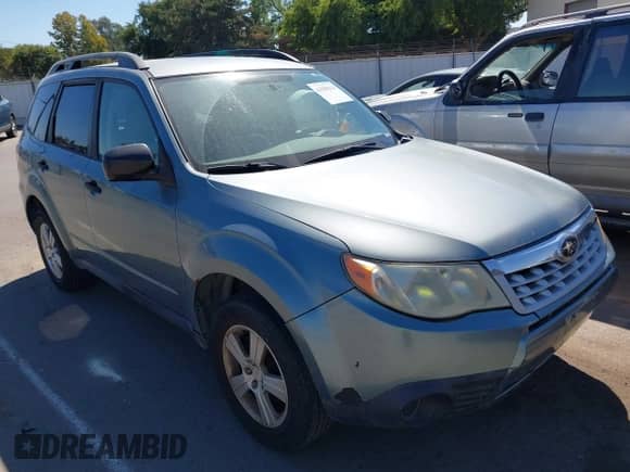 2012 Subaru Forester X z VIN JF2SHABC8CH432356, wystawiony jako IAAI lot #43390315 z przebiegiem 167 937 mil mil oraz . Historia ofert i sprzedaży dostępna na DreamBid. Obrazek 1.