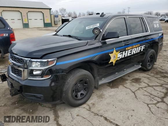 2015 Chevrolet Tahoe Commercial with VIN 1GNSK2EC4FR650124, listed as a Copart auction lot 44810695 with 235,301 mi miles and Salvage title. Bid and sale history available at DreamBid. Image 1.