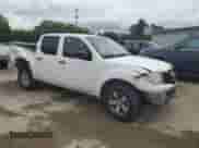 2010 Nissan Frontier SE with VIN 1N6AD0EVXAC432959, listed as a Copart auction lot 54996094 with 167,155 mi miles and Salvage title. Bid and sale history available at DreamBid. Image 4.