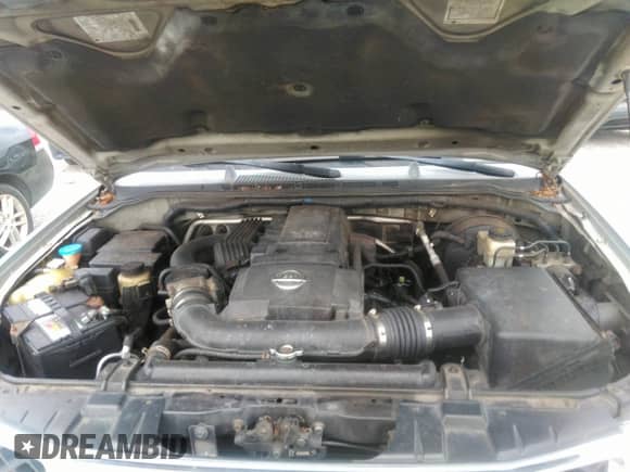 2005 Nissan Pathfinder SE z VIN 5N1AR18W05C751884, wystawiony jako IAAI lot #42849918 z przebiegiem 211 704 mil mil oraz . Historia ofert i sprzedaży dostępna na DreamBid. Obrazek 10.