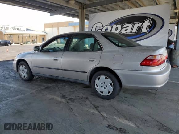 1999 Honda Accord LX z VIN 1HGCG1640XA011756, wystawiony jako Copart lot #56797175 z przebiegiem 191 097 mil mil oraz Czysty tytuł • Clean title. Historia ofert i sprzedaży dostępna na DreamBid. Obrazek 2.