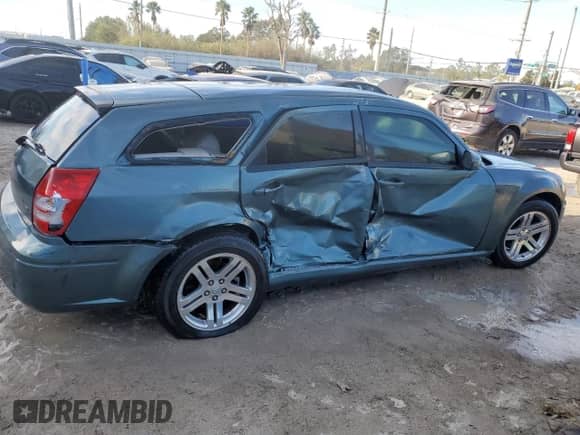 2005 Dodge Magnum RT with VIN 2D4GV58295H549141, listed as a Copart auction lot 76452934 with 194,588 mi miles and Salvage title. Bid and sale history available at DreamBid. Image 3.