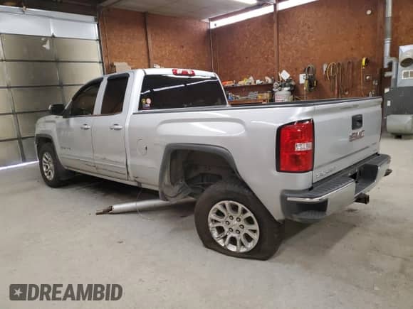 2018 GMC Sierra 1500 SLE с VIN 1GTV2MEC1JZ245395, выставлен на аукционе Copart как лот 70380975 с пробегом 89 845 миль миль и Списание • Salvage title. История ставок и продаж доступна на DreamBid. Изображение 2.