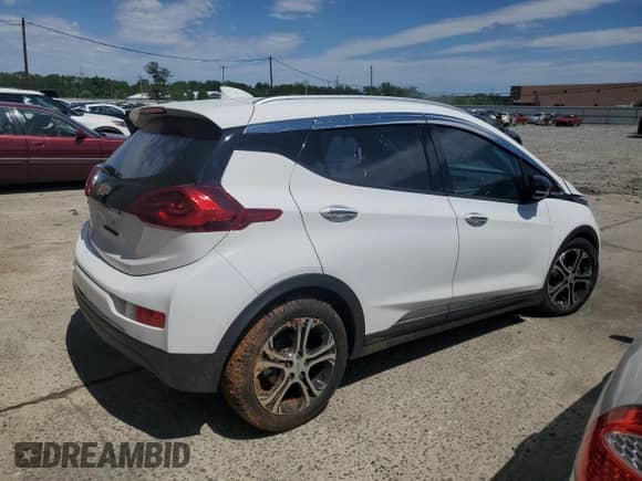 2021 Chevrolet Bolt EV Premier с VIN 1G1FZ6S04M4104157, выставлен на аукционе Copart как лот 57440175 с пробегом 100 236 миль миль и Списание • Salvage title. История ставок и продаж доступна на DreamBid. Изображение 3.