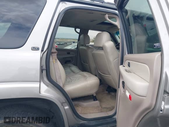 2002 Chevrolet Tahoe LS with VIN 1GNEC13ZX2J265803, listed as a IAAI auction lot 42571325 with 265,954 mi miles and . Bid and sale history available at DreamBid. Image 8.