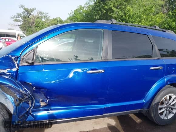 2015 Dodge Journey SXT with VIN 3C4PDDBGXFT574556, listed as a IAAI auction lot 42258095 with 214,267 mi miles and . Bid and sale history available at DreamBid. Image 20.