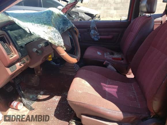 1992 Nissan Frontier z VIN 1N6SD16S9NC380289, wystawiony jako Copart lot #50671394 z przebiegiem 204 496 mil mil oraz Szkoda całkowita • Salvage title. Historia ofert i sprzedaży dostępna na DreamBid. Obrazek 7.