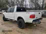 2002 Ford F-150 XLT с VIN 1FTRW08682KC80529, выставлен на аукционе Copart как лот 37546994 с пробегом 159 980 миль миль и Списание • Salvage title. История ставок и продаж доступна на DreamBid. Изображение 2.
