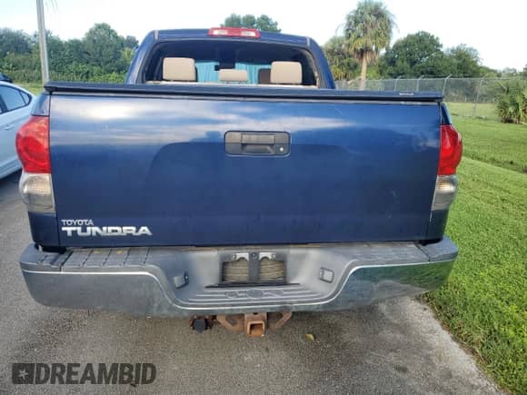 2007 Toyota Tundra SR5 z VIN 5TBET54117S455677, wystawiony jako Copart lot #74101544 z przebiegiem Nie podano mil oraz Szkoda całkowita • Salvage title. Historia ofert i sprzedaży dostępna na DreamBid. Obrazek 6.