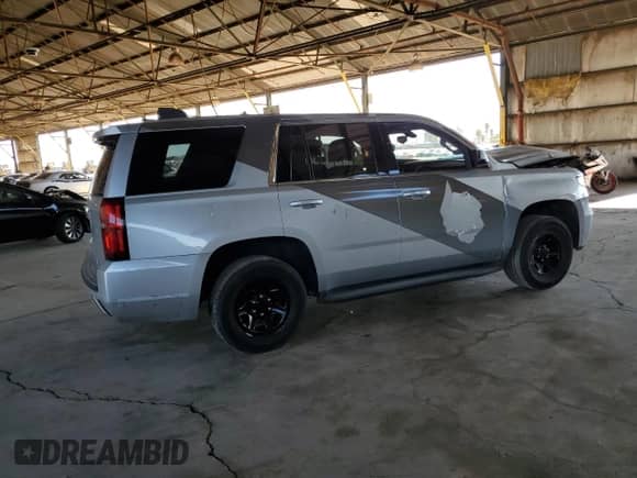 2019 Chevrolet Tahoe Commercial с VIN 1GNLCDEC0KR148833, выставлен на аукционе Copart как лот 70763325 с пробегом 142 521 миль миль и Списание • Salvage title. История ставок и продаж доступна на DreamBid. Изображение 3.