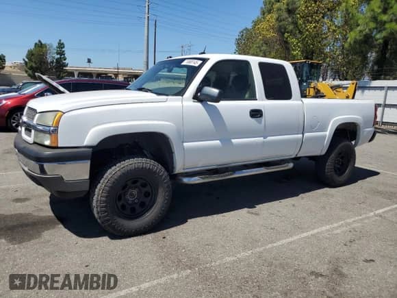 2005 Chevrolet Silverado 1500 LS with VIN 1GCEK19B85E327539, listed as a Copart auction lot 71868145 with 238,597 mi miles and Clean title. Bid and sale history available at DreamBid. Image 1.