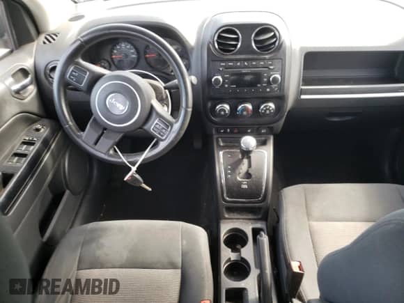 2011 Jeep Compass z VIN 1J4NF1FB9BD277187, wystawiony jako Copart lot #69288125 z przebiegiem 110 932 mil mil oraz Szkoda całkowita • Salvage title. Historia ofert i sprzedaży dostępna na DreamBid. Obrazek 8.