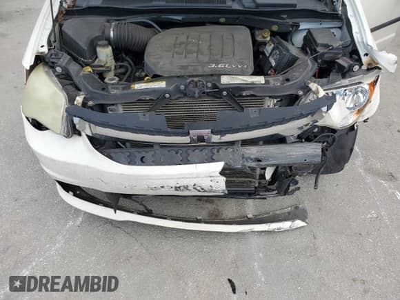2011 Dodge Grand Caravan Cargo with VIN 2D4RN1AG2BR767192, listed as a Copart auction lot 64423635 with 101,633 mi miles and Salvage title. Bid and sale history available at DreamBid. Image 12.