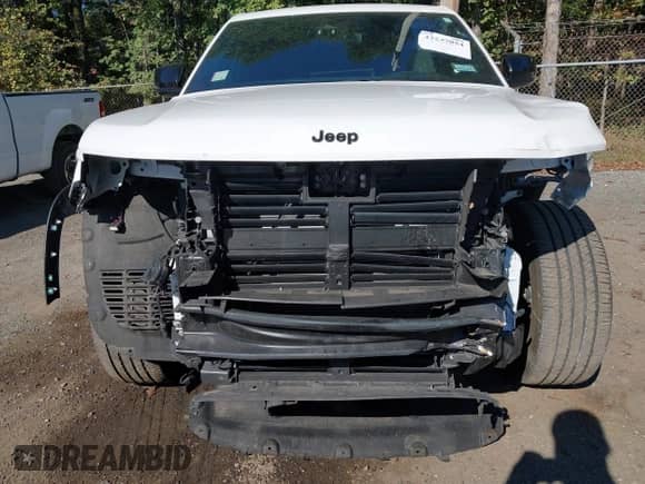 2023 Jeep Grand Cherokee Laredo with VIN 1C4RJHAG4PC513470, listed as a IAAI auction lot 43297054 with 37,533 mi miles and . Bid and sale history available at DreamBid. Image 12.