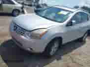 2009 Nissan Rogue SL z VIN JN8AS58T29W054604, wystawiony jako IAAI lot #42671076 z przebiegiem 208 276 mil mil oraz . Historia ofert i sprzedaży dostępna na DreamBid. Obrazek 2.