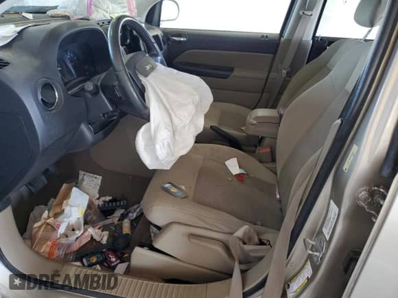2010 Jeep Compass Latitude с VIN 1J4NF1FB5AD642964, выставлен на аукционе Copart как лот 70879735 с пробегом Не указан миль и Списание • Salvage title. История ставок и продаж доступна на DreamBid. Изображение 7.