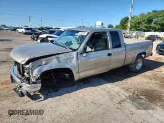 1999 Chevrolet Silverado 2500 with VIN 1GCGK29R4XF051160, listed as a Copart auction lot 67233005 with 226,759 mi miles and Salvage title. Bid and sale history available at DreamBid. Image 1.