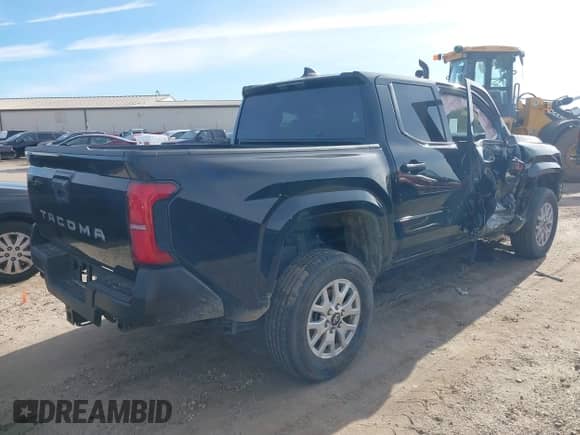2024 Toyota Tacoma SR with VIN 3TYKD5HN5RT003937, listed as a IAAI auction lot 41339802 with 13,117 mi miles and . Bid and sale history available at DreamBid. Image 4.