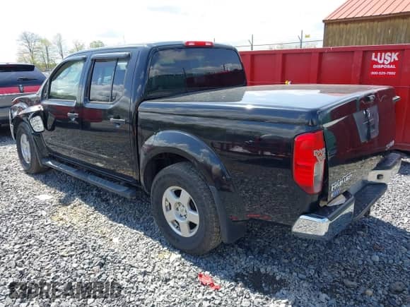 2007 Nissan Frontier Nismo with VIN 1N6AD07W37C447818, listed as a IAAI auction lot 42156921 with 141,051 mi miles and . Bid and sale history available at DreamBid. Image 3.