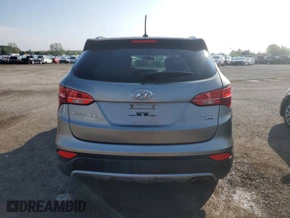 2014 Hyundai Santa Fe with VIN 5XYZUDLB8EG126320, listed as a Copart auction lot 70060645 with 187,756 mi miles and Salvage title. Bid and sale history available at DreamBid. Image 6.