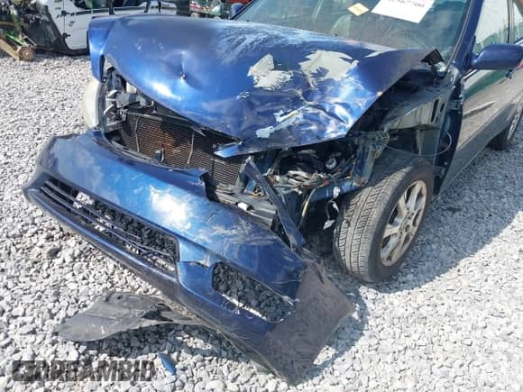 2005 Toyota Camry LE with VIN 4T1BF30K55U105946, listed as a IAAI auction lot 42567700 with Not provided miles and . Bid and sale history available at DreamBid. Image 19.