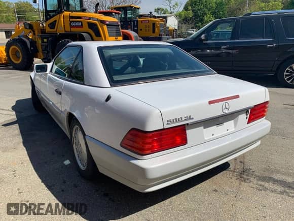 1992 Mercedes-Benz 500 z VIN WDBFA66EXNF052820, wystawiony jako Copart lot #63763305 z przebiegiem 113 571 mil mil oraz Czysty tytuł • Clean title. Historia ofert i sprzedaży dostępna na DreamBid. Obrazek 3.