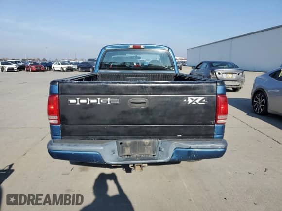 2003 Dodge Dakota with VIN 1D7GG32NX3S252020, listed as a Copart auction lot 83869424 with 258,061 mi miles and Salvage title. Bid and sale history available at DreamBid. Image 6.
