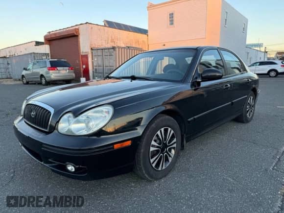 2004 Hyundai Sonata z VIN KMHWF25H94A000139, wystawiony jako Copart lot #84455464 z przebiegiem 129 267 mil mil oraz Czysty tytuł • Clean title. Historia ofert i sprzedaży dostępna na DreamBid. Obrazek 2.