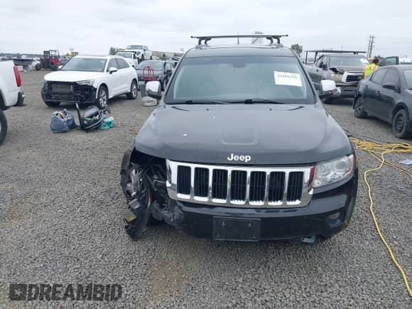 2013 Jeep Grand Cherokee Limited z VIN 1C4RJFBT4DC503856, wystawiony jako IAAI lot #43166356 z przebiegiem 143 262 mil mil oraz . Historia ofert i sprzedaży dostępna na DreamBid. Obrazek 12.