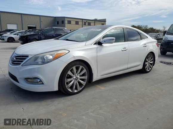 2013 Hyundai Azera with VIN KMHFH4JGXDA245793, listed as a Copart auction lot 82435324 with 144,269 mi miles and Clean title. Bid and sale history available at DreamBid. Image 1.