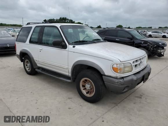 2000 Ford Explorer Sport z VIN 1FMYU60E0YUA70071, wystawiony jako Copart lot #54078615 z przebiegiem 189 103 mil mil oraz Czysty tytuł • Clean title. Historia ofert i sprzedaży dostępna na DreamBid. Obrazek 4.