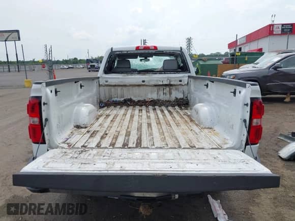 2017 GMC Sierra 1500 with VIN 1GTN1LEH2HZ310922, listed as a IAAI auction lot 42407465 with Not provided miles and . Bid and sale history available at DreamBid. Image 18.