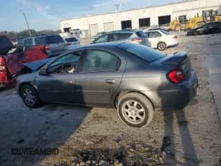 2005 Dodge Neon SXT with VIN 1B3ES56C85D280573, listed as a Copart auction lot 84171994 with 93,469 mi miles and Salvage title. Bid and sale history available at DreamBid. Image 2.