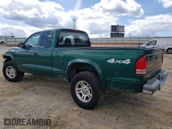 2003 Dodge Dakota с VIN 1D7HG12X33S231147, выставлен на аукционе Copart как лот 70668215 с пробегом 144 455 миль миль и Списание • Salvage title. История ставок и продаж доступна на DreamBid. Изображение 2.