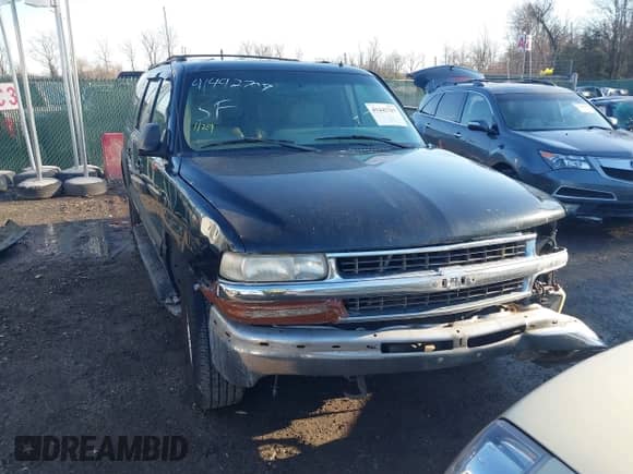 2002 Chevrolet Suburban Z71 z VIN 3GNFK16Z42G199561, wystawiony jako IAAI lot #41442707 z przebiegiem 229 823 mil mil oraz . Historia ofert i sprzedaży dostępna na DreamBid. Obrazek 13.
