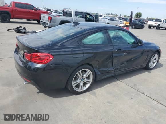 2019 BMW 4 Series 440i with VIN WBA4W7C51KAG51828, listed as a Copart auction lot 81678695 with 14,311 mi miles and Salvage title. Bid and sale history available at DreamBid. Image 3.